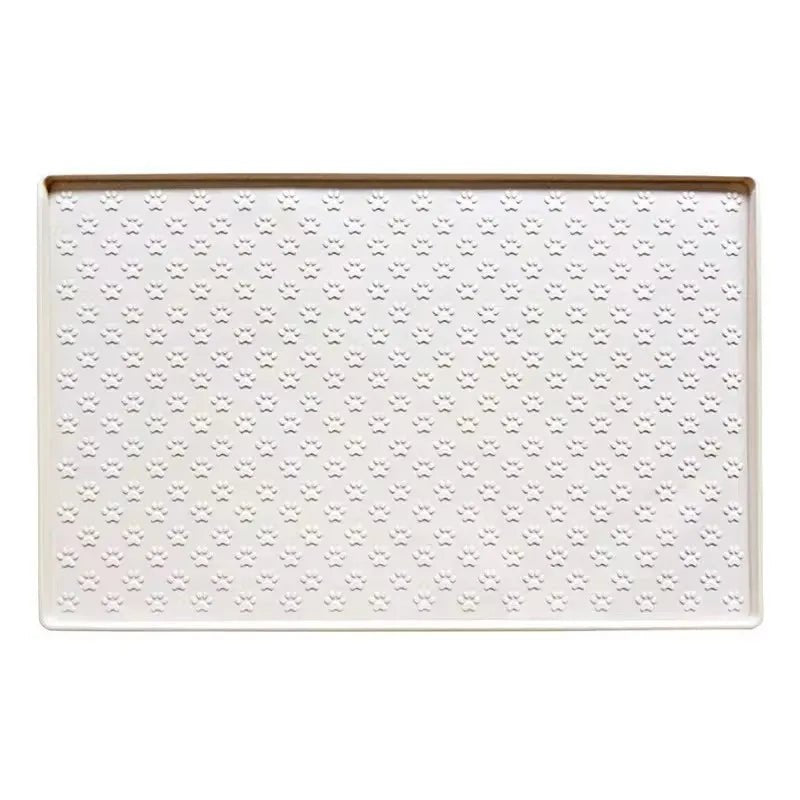 Tapis antiderapant gamelle chien de couleur blanc avec des pattes 
