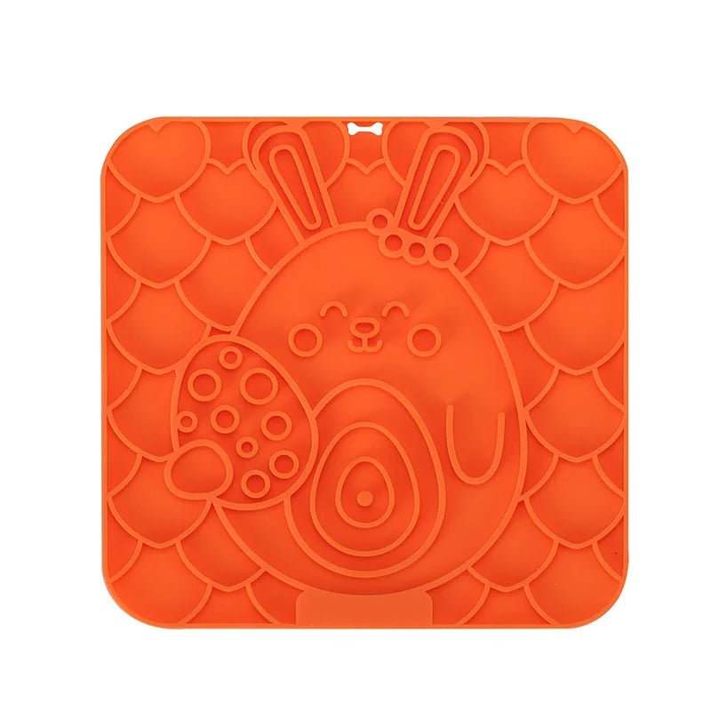 tapis anti glouton pour chien de couleur orange avec un lapin de pâque. Image produit boutiquechien  