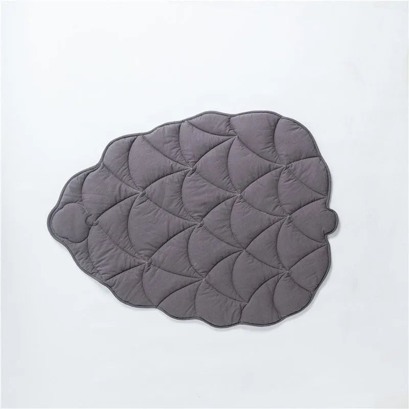 Tapis en forme de pomme de pain de couleur gris. Tapis design et élégant de Boutiquechien 